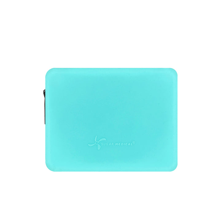 Back of the aqua Omnipod® Protective Travel Case: The back of the black Omnipod® protective travel case, showing the smooth surface and discreet design.