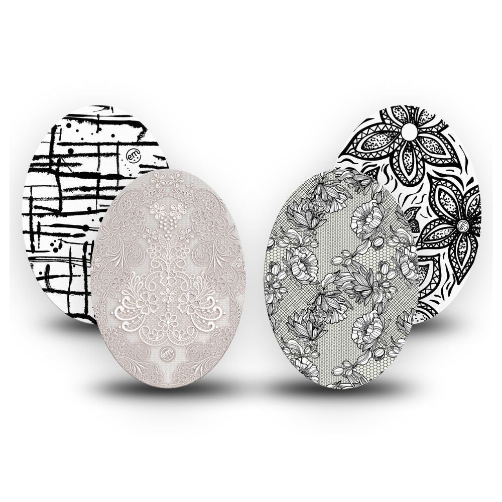 One of each of Expression Med Medtronic patch designs including Black Lace, B&W Drip, Black Tie Floral and Lace
