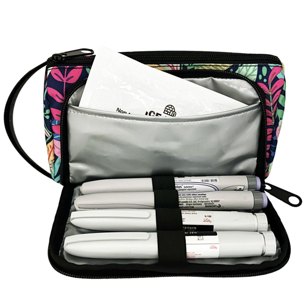 A blue floral pattern Insulated Diabetes Insulin Supply Case with insulated pocket open and an ice pack in slip pocket and four insulin pens secured in loops.