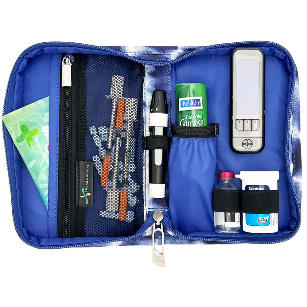 Sugar Medical Diabetes Supply Case II blue tie dye design inside set up with glucose meter, test strips, lancet, glucose tabs and wipes.