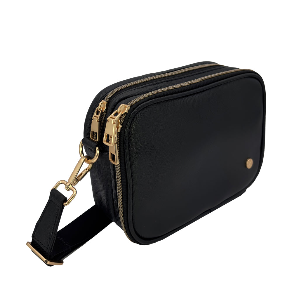 Side view of the Black Essential Diabetes Purse, showing its slim profile, smooth texture, and discreet zipper detail.