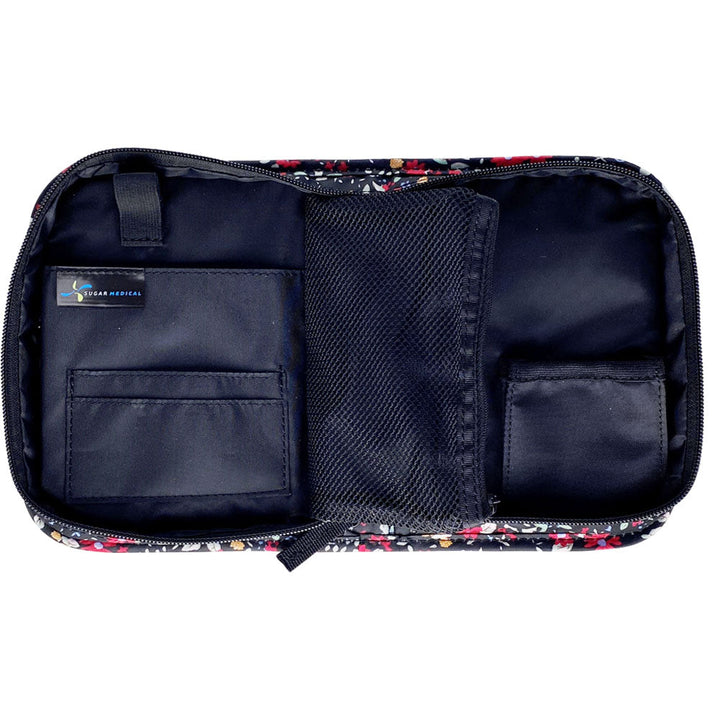 Inside of the Flora Omnipod Case on the left showing the pockets to keep all your diabetic supplies organized.