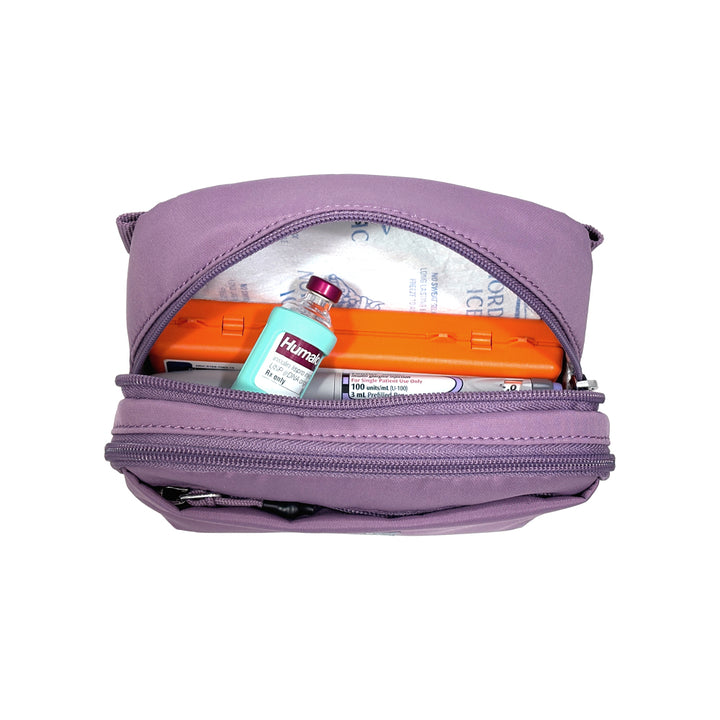 The back insulated pocket opened with glucagon, insulin vial, and ice pack in it.