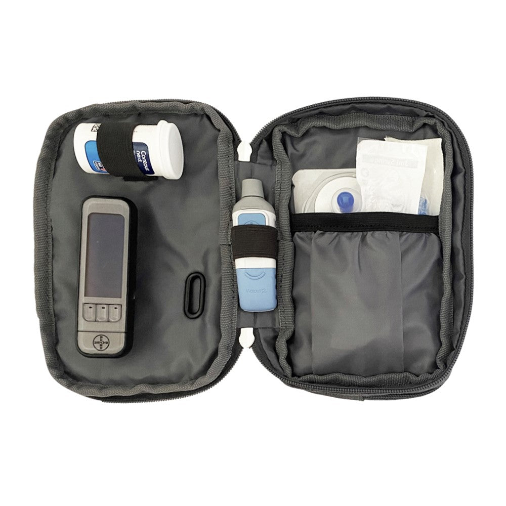 Diabetes Insulated Convertible Belt Bag in grey inside set up with glucose meter, test strips, lancet and Medtronic pump supplies.