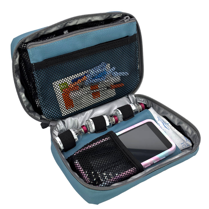 The back section has a mesh pocket with Omnipod pump supplies and three loops to secure three insulin vials.
