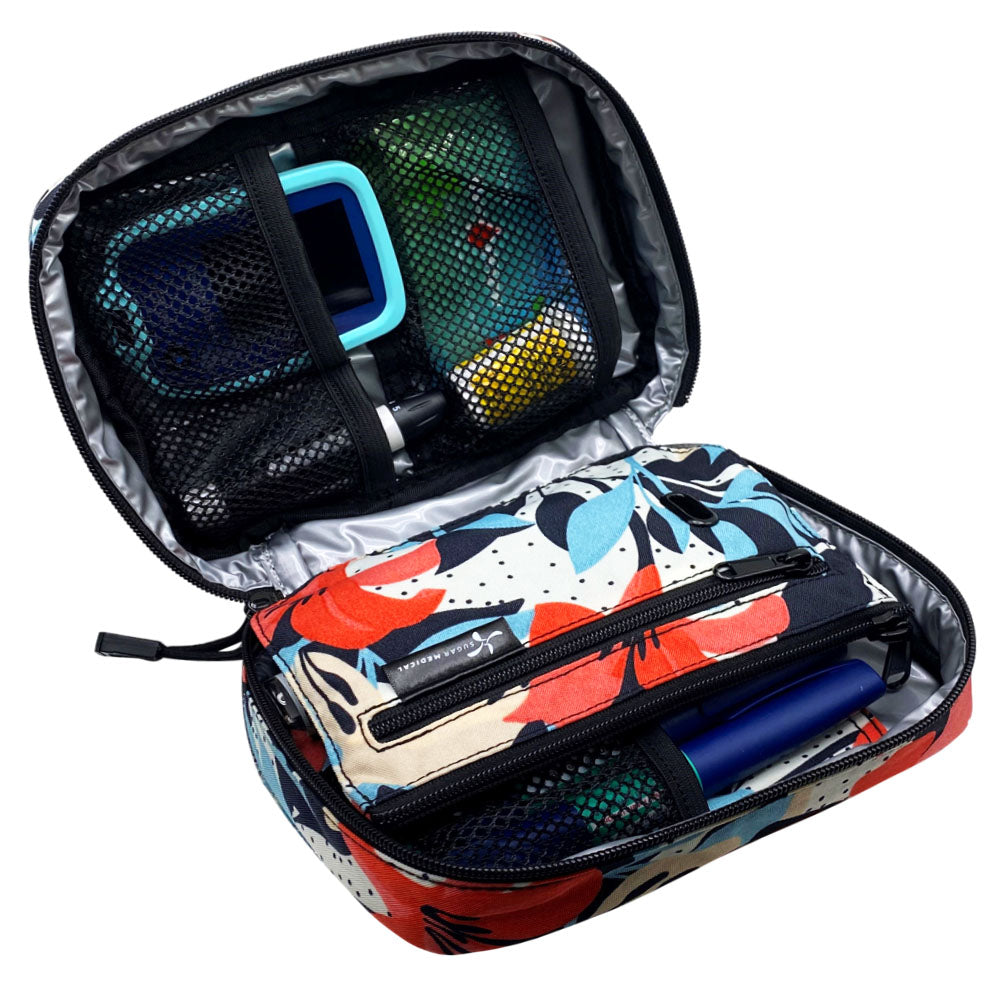 The front section of the Mod Floral diabetes organizer has three mesh pockets to secure your diabetic supplies.