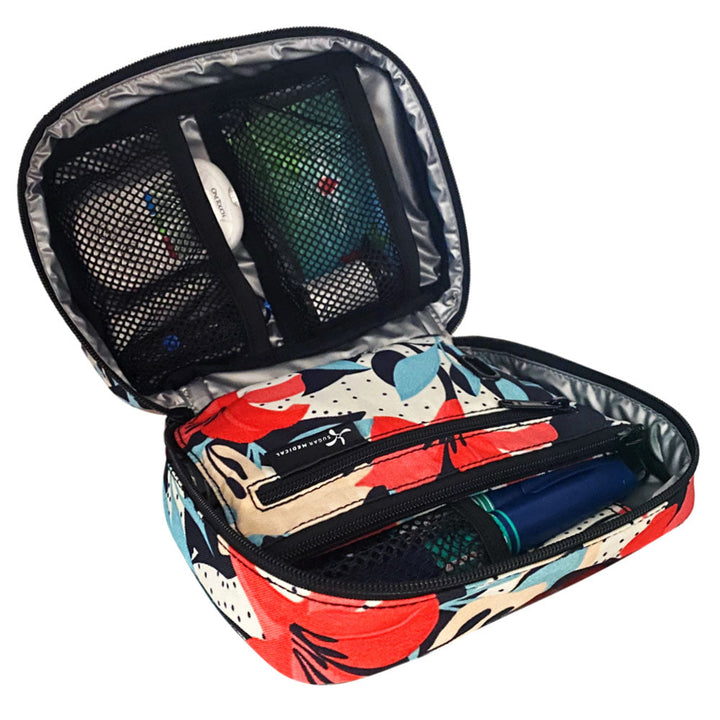 The front section of the Mod Floral diabetes organizer has three mesh pockets to secure your diabetic supplies.