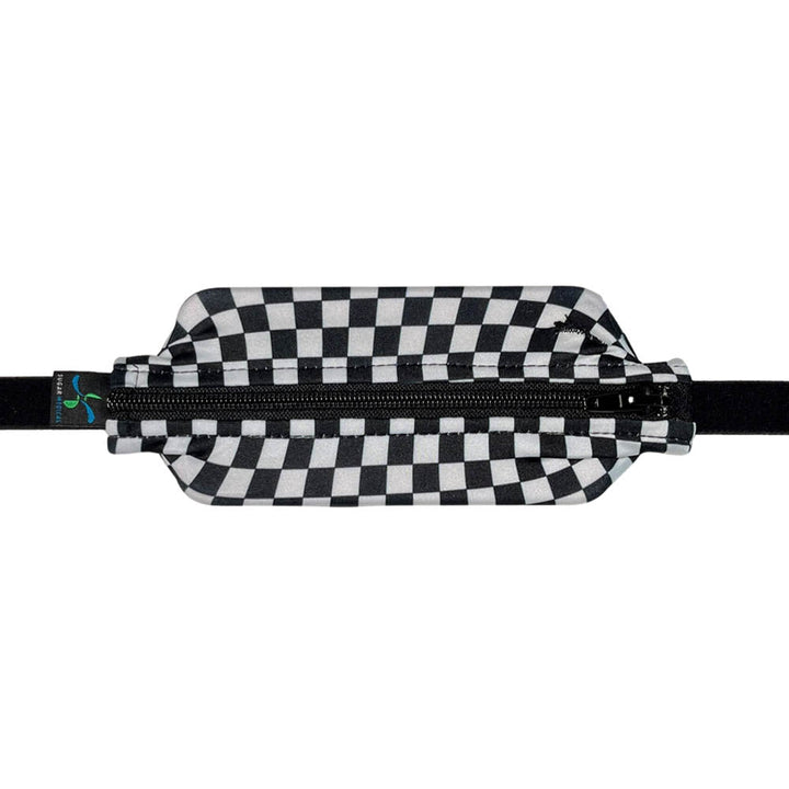 Kids black and white checkered patter with black zipper SPI belt closed with Omnipod 5 controller.