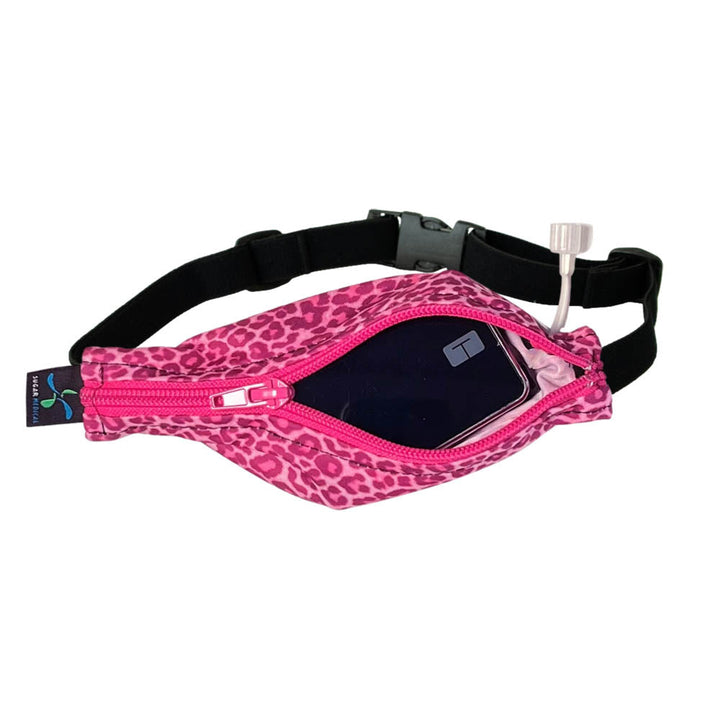 Kids pink and purple cheetah pattern SPI belt open with Tandem pump inside and tubbing coming out the side hole.