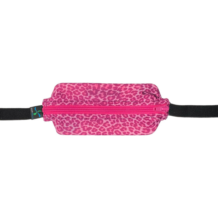 Kids pink and purple cheetah pattern SPI belt closed with Omnipod 5 controller inside.