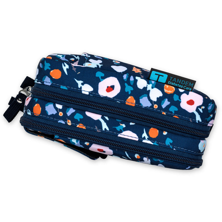 Tandem supply case in blue floral designed in collaboration with Tandem Diabetes Care