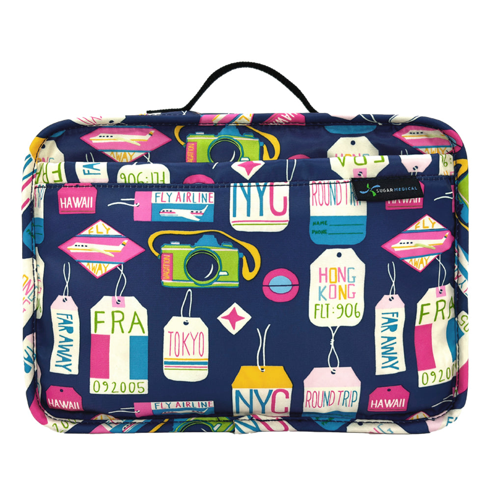 Navy Sugar Medical Insulated Diabetes Supply Travel Bag with colorful travel tags on it.
