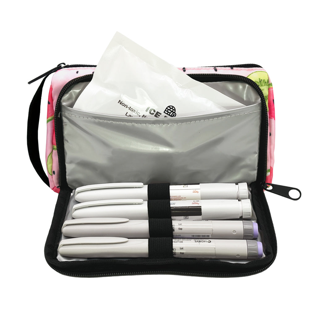 A pink watermelon pattern Insulated Diabetes Insulin Supply Case with insulated pocket open and an ice pack in slip pocket and four insulin pens secured in loops.