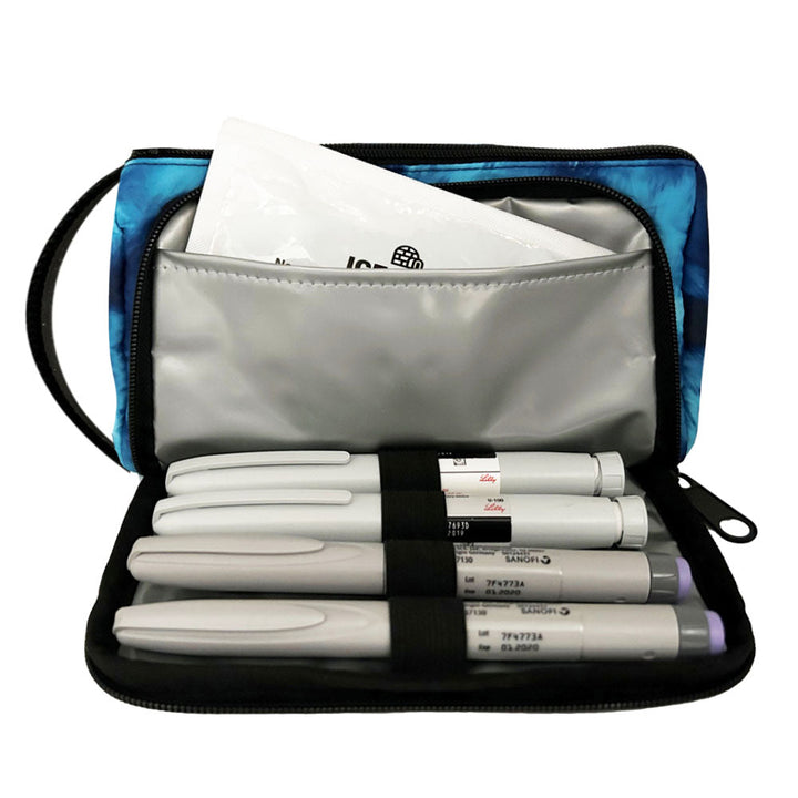 A blue wave Insulated Diabetes Insulin Supply Case with insulated pocket open and an ice pack in slip pocket and four insulin pens secured in loops.