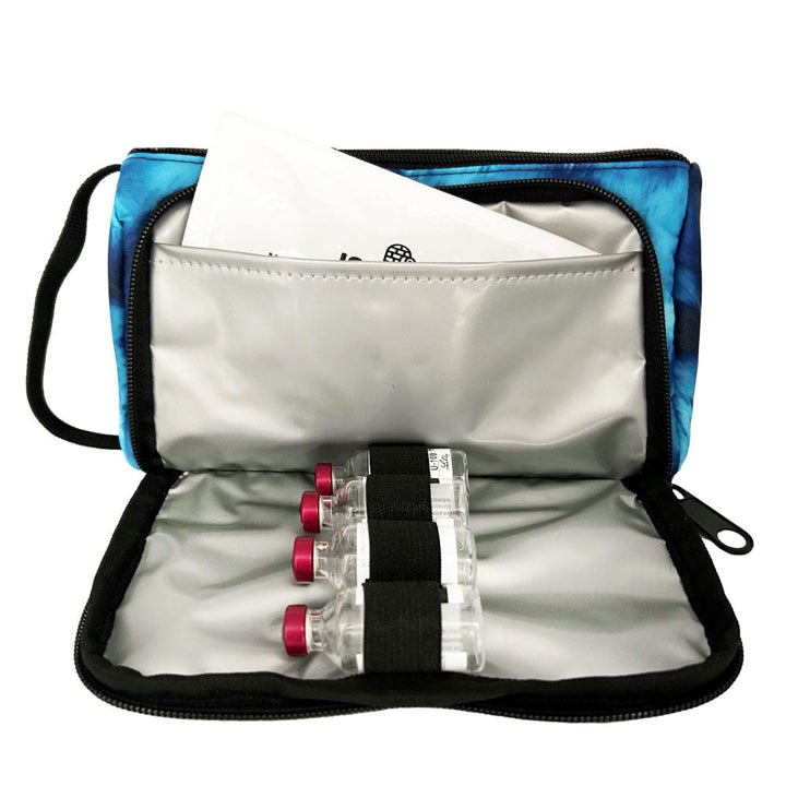 A blue wave Insulated Diabetes Insulin Supply Case with insulated pocket open and an ice pack in slip pocket and four insulin vials secured in loops.