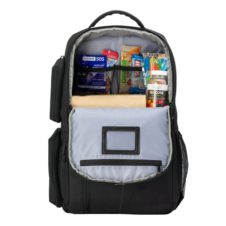 Charcoal grey XL Travel Backpack top pocket open with book, diabetic supply bag, clothes and mesh pocket with chargers.