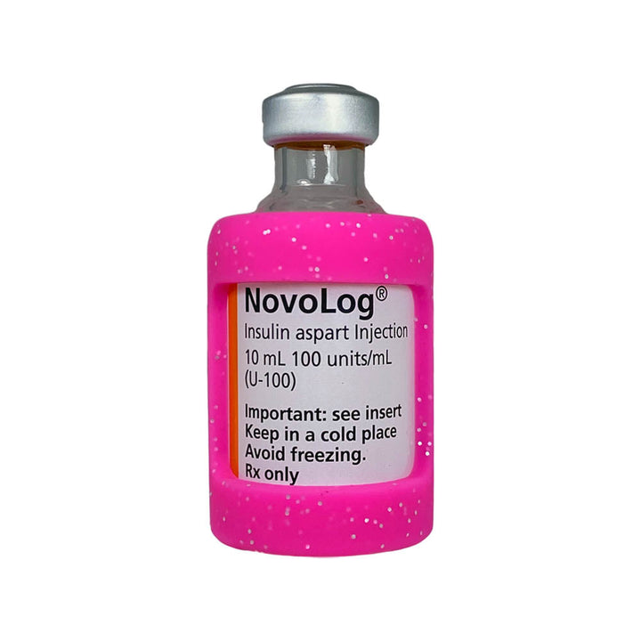 Front side of insulin vial with pink glitter silicone insulin vial sleeve for protection.