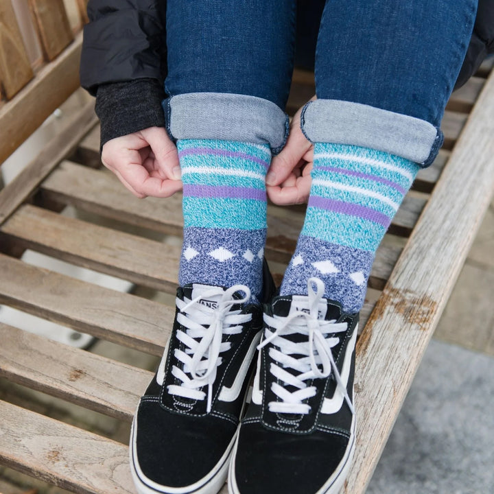 A person wearing a pair of Blue Star Dr. Segal's Premium Diabetic Socks.