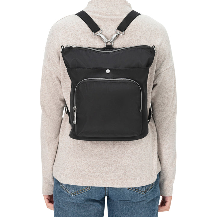 Women wearing Diabetes Nylon Backpack in black on back with two straps.