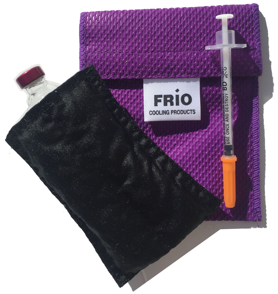 Frio Mini Insulin Cooling Case Purple with insulin vial in it.