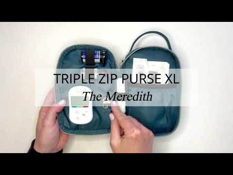 Video of the XL Triple Zip Purse with a woman loading with diabetes supplies.