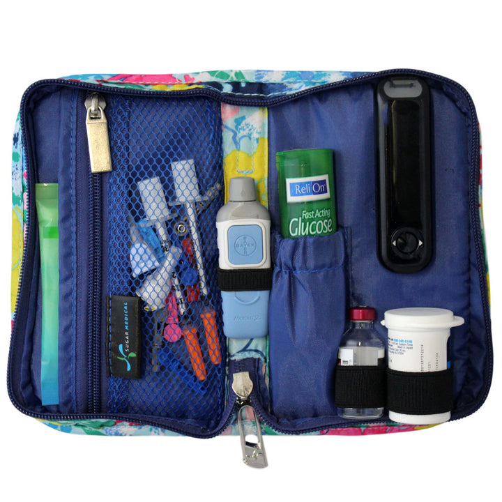 Sugar Medical Diabetes Supply Case II light blue with flowers inside set up with glucose meter, test strips, lancet, and glucose tabs and wipes.