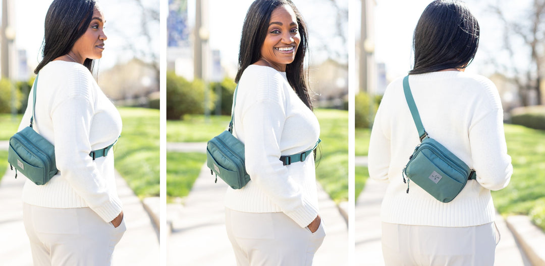 Women wearing a pine green convertible insulated diabetes case sling back style. 