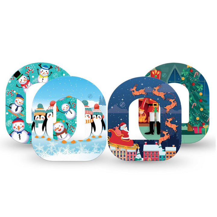 Four Christmas-themed Omnipod tapes arranged in front of a white background, featuring festive illustrations including snowmen, penguins, Santa, reindeer, a fireplace, and a Christmas tree.