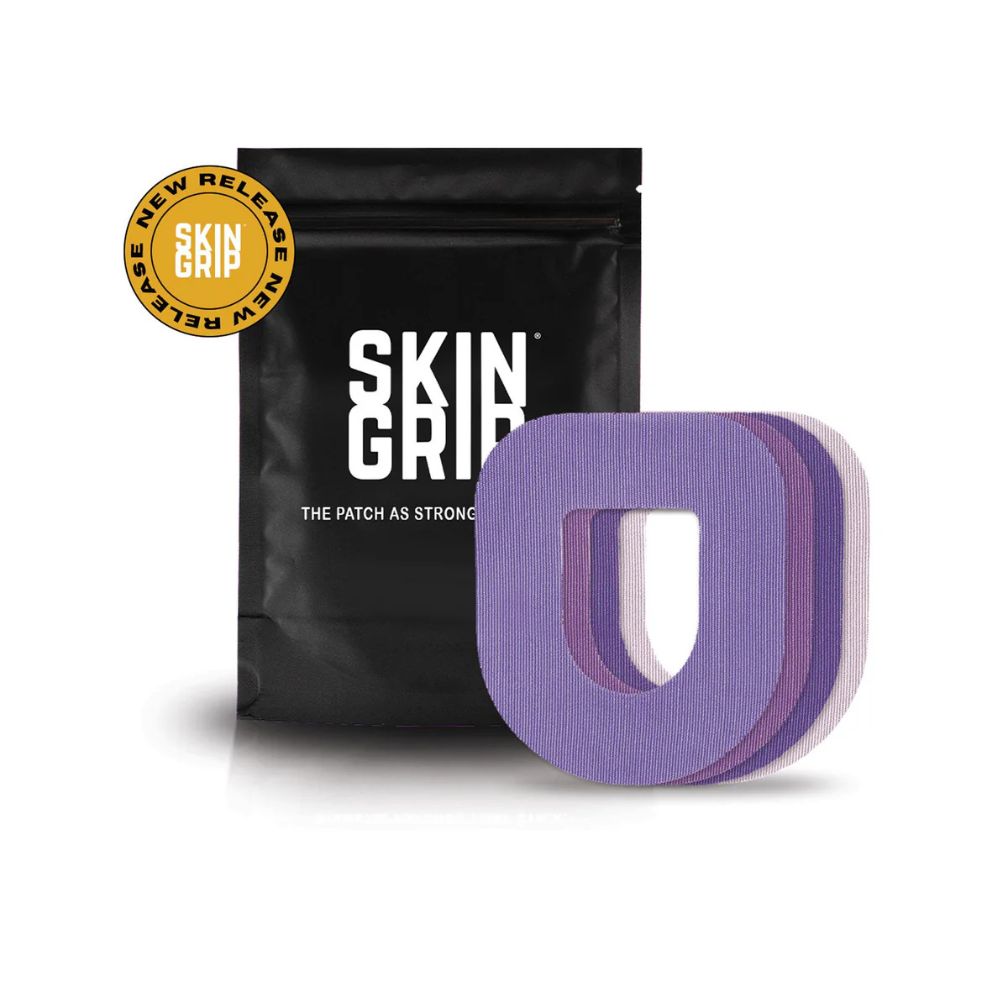 A black package that says Skin Grip containing the 20 adhesive patches and the purple colored Omnipod adhesive patches around a white pod.
