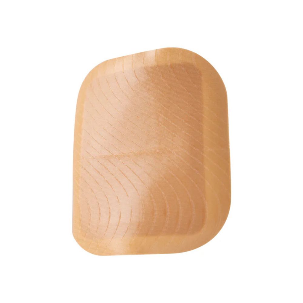 Tan Skin Grip adhesive patch for Tandem Mobi insulin pump shown against a plain background.