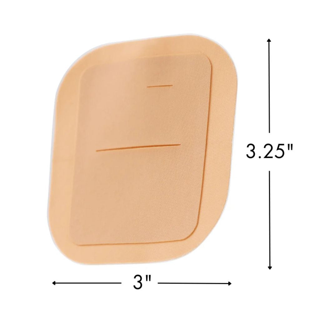 TanSkin Grip adhesive patch securely holding a Tandem Mobi insulin pump on skin; patch measures approximately 3.25 x 3 inches, designed for a snug, low-profile fit.