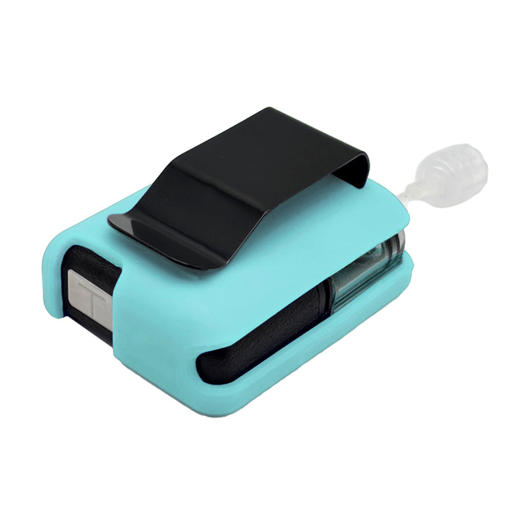 Aqua Tandem Mobi EZ-To-Charge Clip with Mobi insulin pump inside the case, lying flat on a surface.