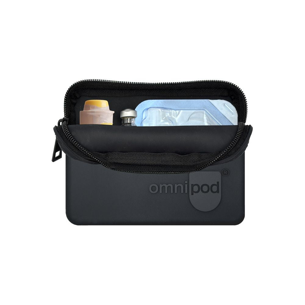 Insulin and Baqsimi nasal glucagon: The interior of the black Omnipod® protective travel case showing an insulin vial and a Baqsimi nasal glucagon arranged neatly within the case.