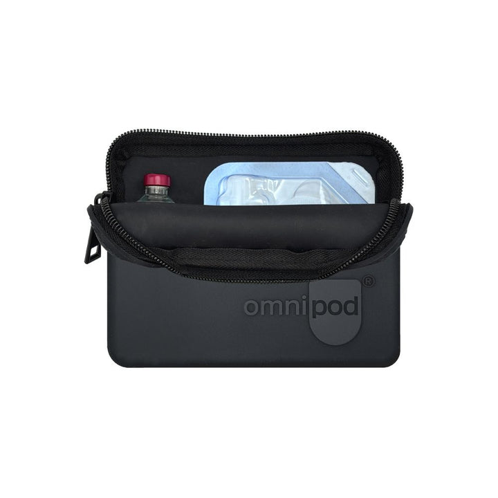 Set up with pod and insulin: The black Omnipod® protective travel case opened to reveal an Omnipod® insulin pod and an insulin vial placed inside, demonstrating the case's organized storage capabilities.