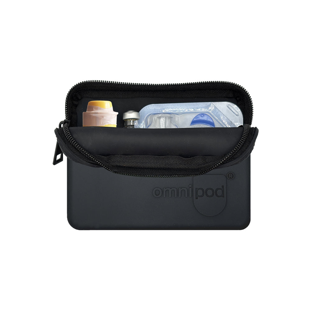 Insulin and Baqsimi nasal glucagon: The interior of the black Omnipod® protective travel case showing an insulin vial and a Baqsimi nasal glucagon arranged neatly within the case.