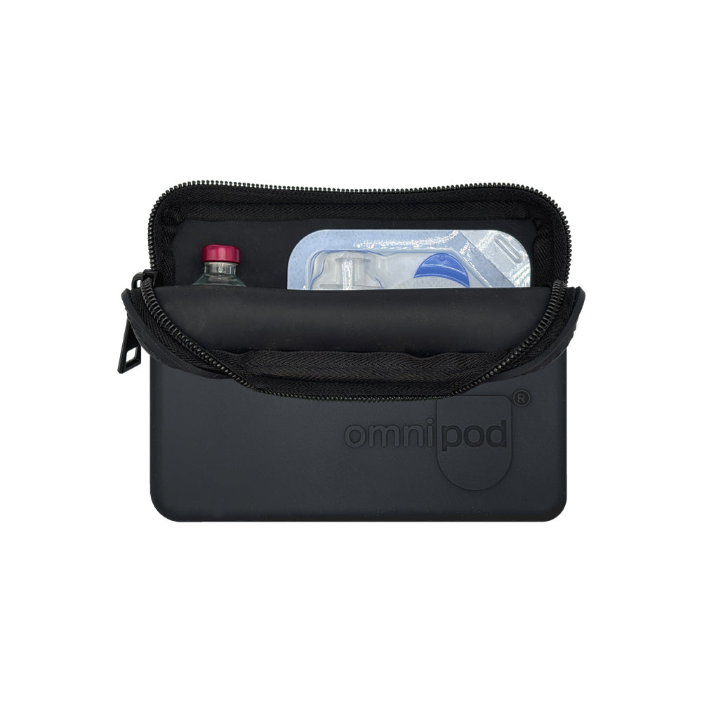 Set up with pod and insulin: The black Omnipod® protective travel case opened to reveal an Omnipod® insulin pod and an insulin vial placed inside, demonstrating the case's organized storage capabilities.