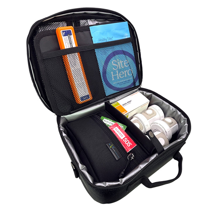 Diabetes Insulated Travel Bag in black back compartment for a glucagon kit, site hero, Dexcom supplies, snacks, glucose SOS, and includes a removable pouch.