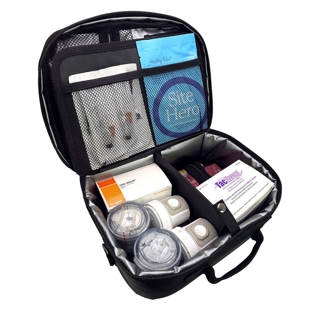 Diabetes Insulated Travel Bag in black back compartment for site hero, Tandem supplies, Dexcom, tac a away and wipes.