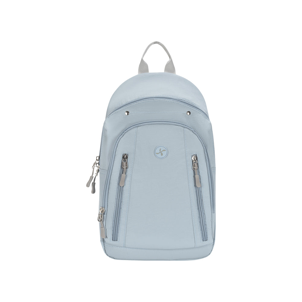 A light blue backpack with silver zippers, a top carry handle, and a circular logo on the front pocket, shown against a plain white background.