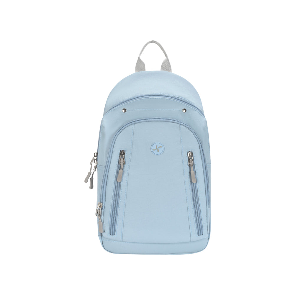 A light blue backpack with silver zippers, a top carry handle, and a circular logo on the front pocket, shown against a plain white background.