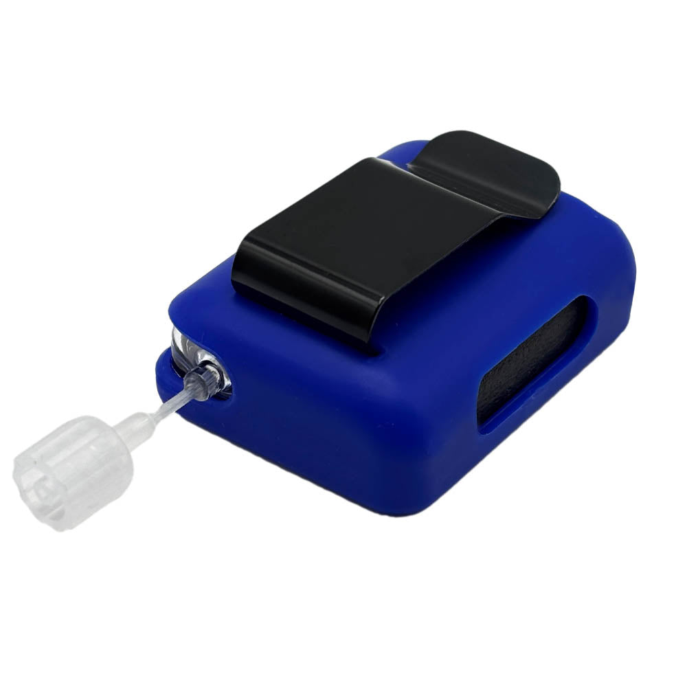 Blue Tandem Mobi EZ-To-Charge Clip with Mobi insulin pump inside the case, laying flat on a surface.