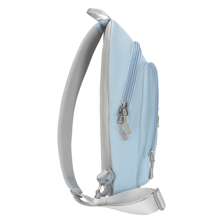 A light blue sling backpack shown from the side profile on a solid white background, featuring a padded shoulder strap and silver zipper pulls.