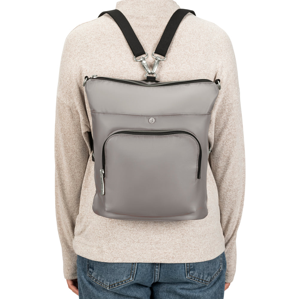 Women wearing Diabetes Nylon Backpack in tan on women’s back with two straps. 