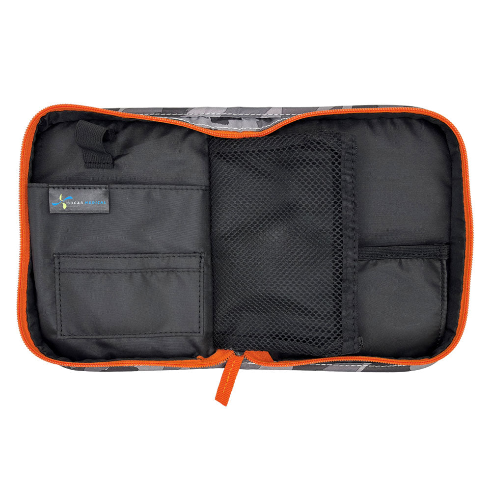 Inside of the Deep Dive Omnipod Case on the right showing the pockets to keep all your diabetic supplies organized. 