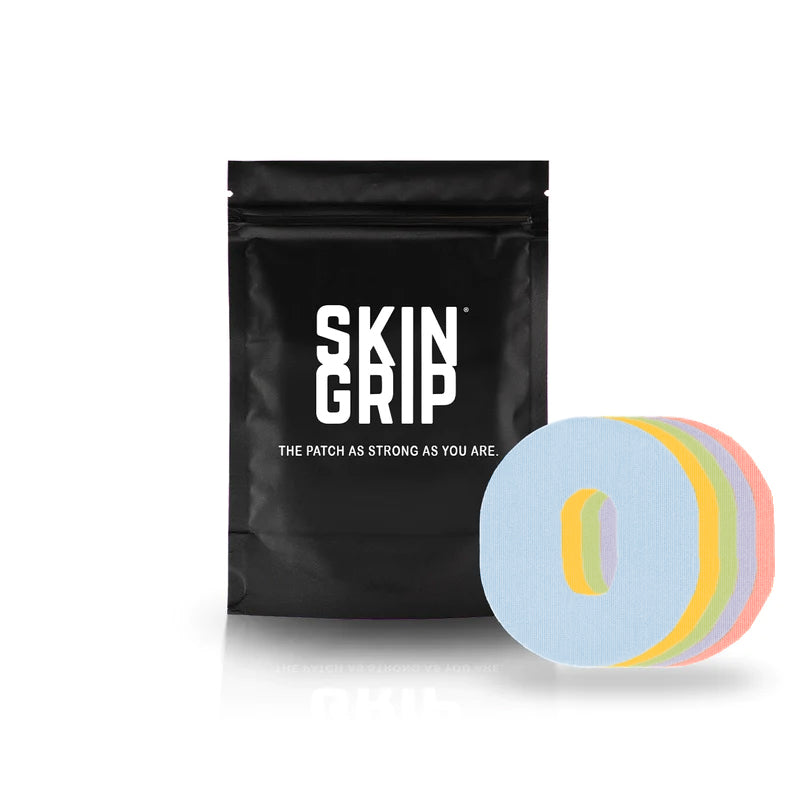 A black package that says Skin Grip containing the 20 adhesive patches and the adhesive patches in pastel blue, yellow, green, purple, and pink designed to go around the Dexcom G6 sensor