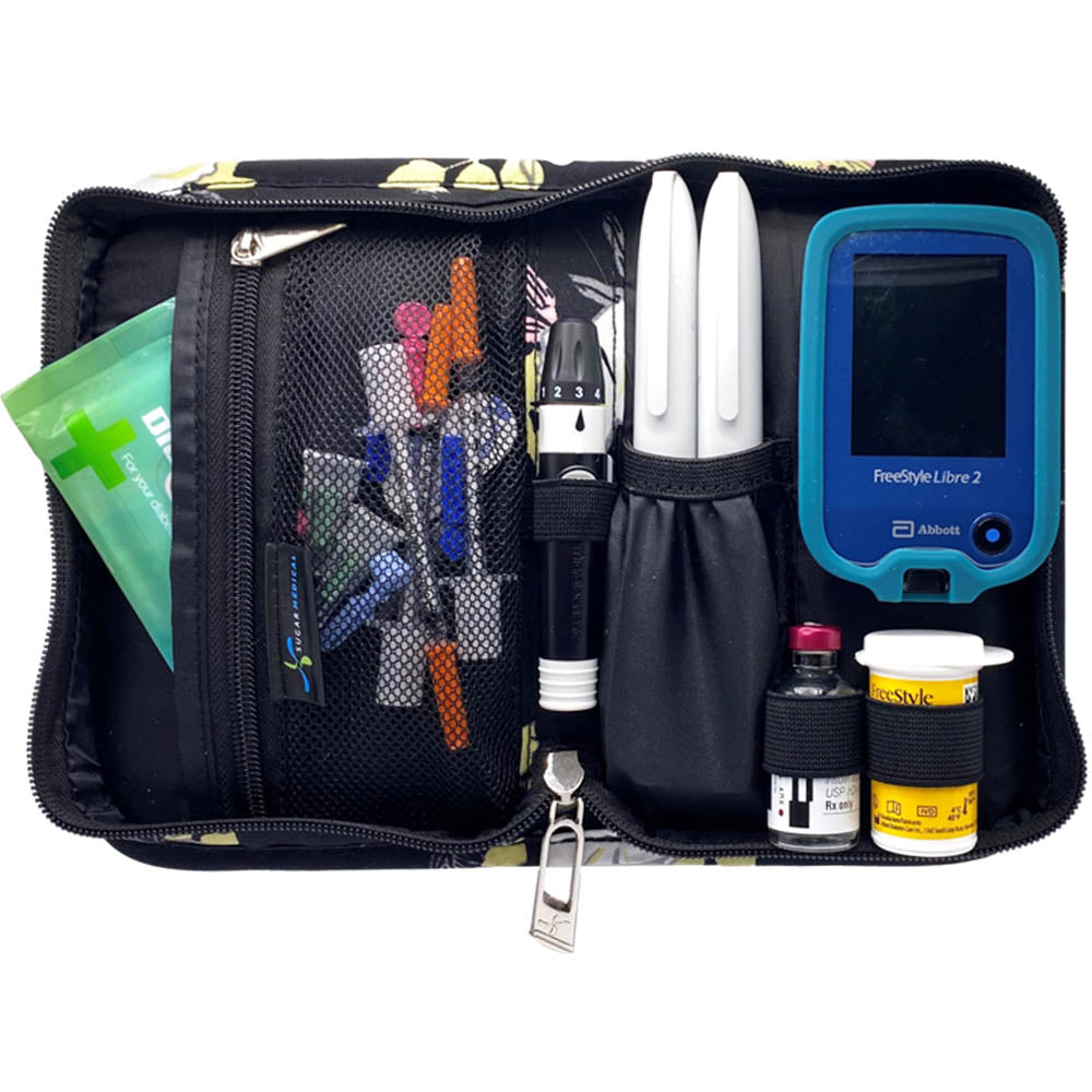 Sugar Medical Diabetes Supply Case II black with flowers inside set up with glucose meter, test strips, lancet, and glucose melts and wipes. 