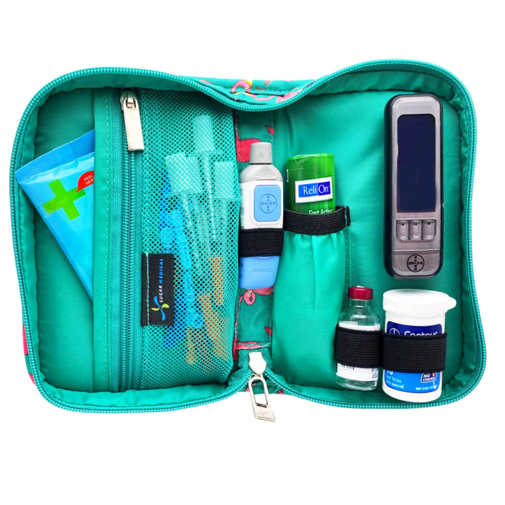 Sugar Medical Diabetes Supply Case II teal with pink flamingos inside set up with glucose meter, test strips, lancet, glucose tabs and wipes. 