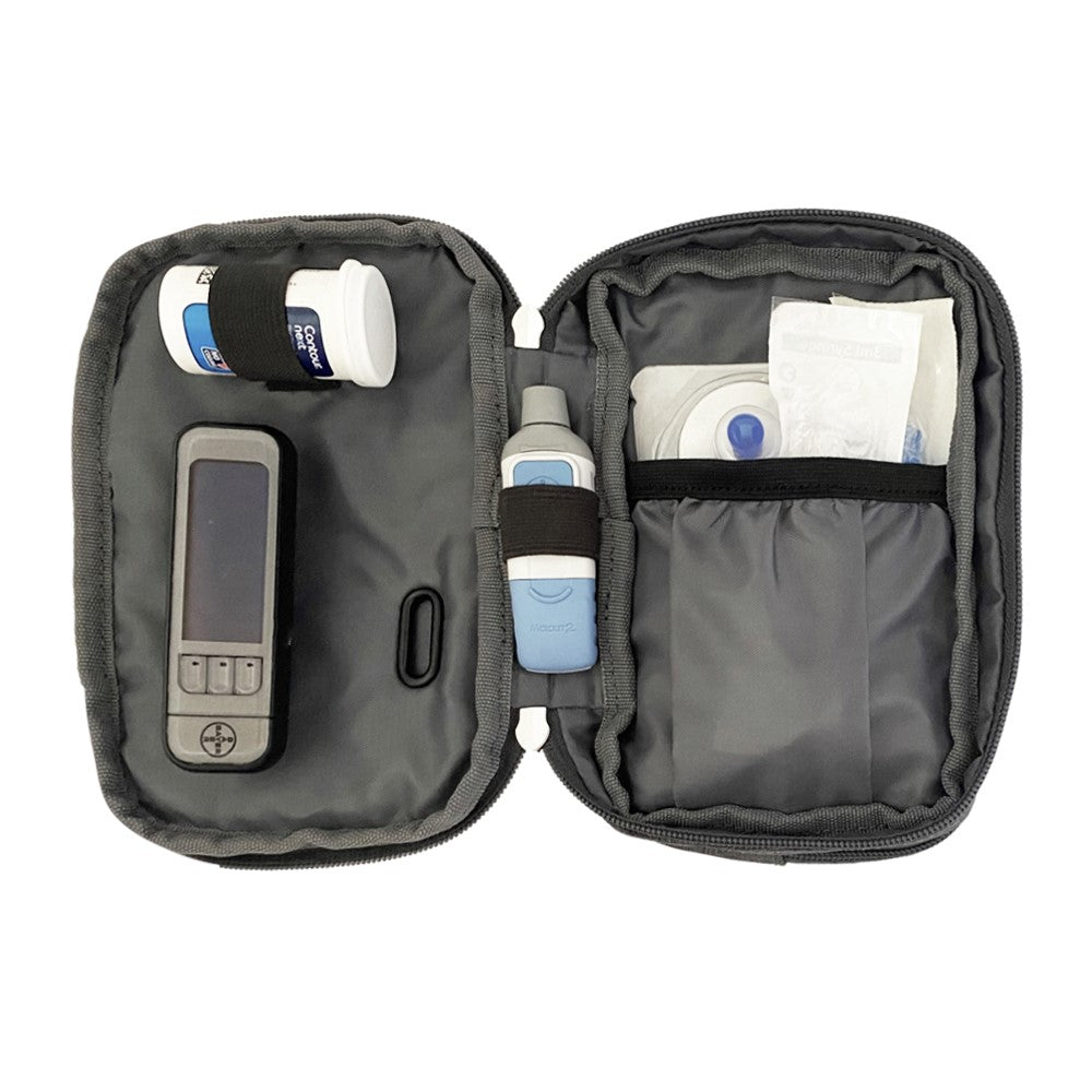 Diabetes Insulated Convertible Bag in Grey inside set up with glucose meter, test strips, lancet and Metronic pump supplies. 