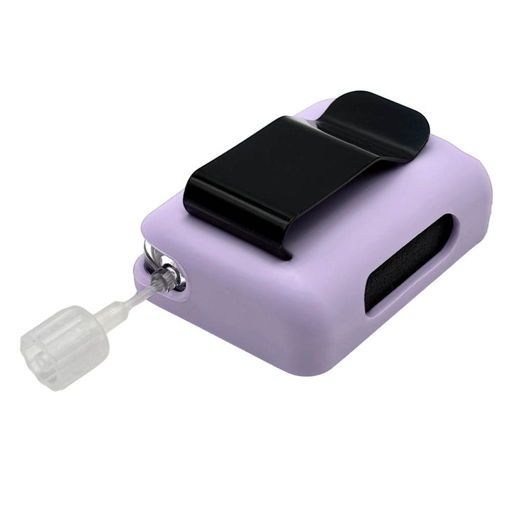 Lavender Tandem Mobi EZ-To-Charge Clip with Mobi insulin pump inside the case, lying flat on a surface.