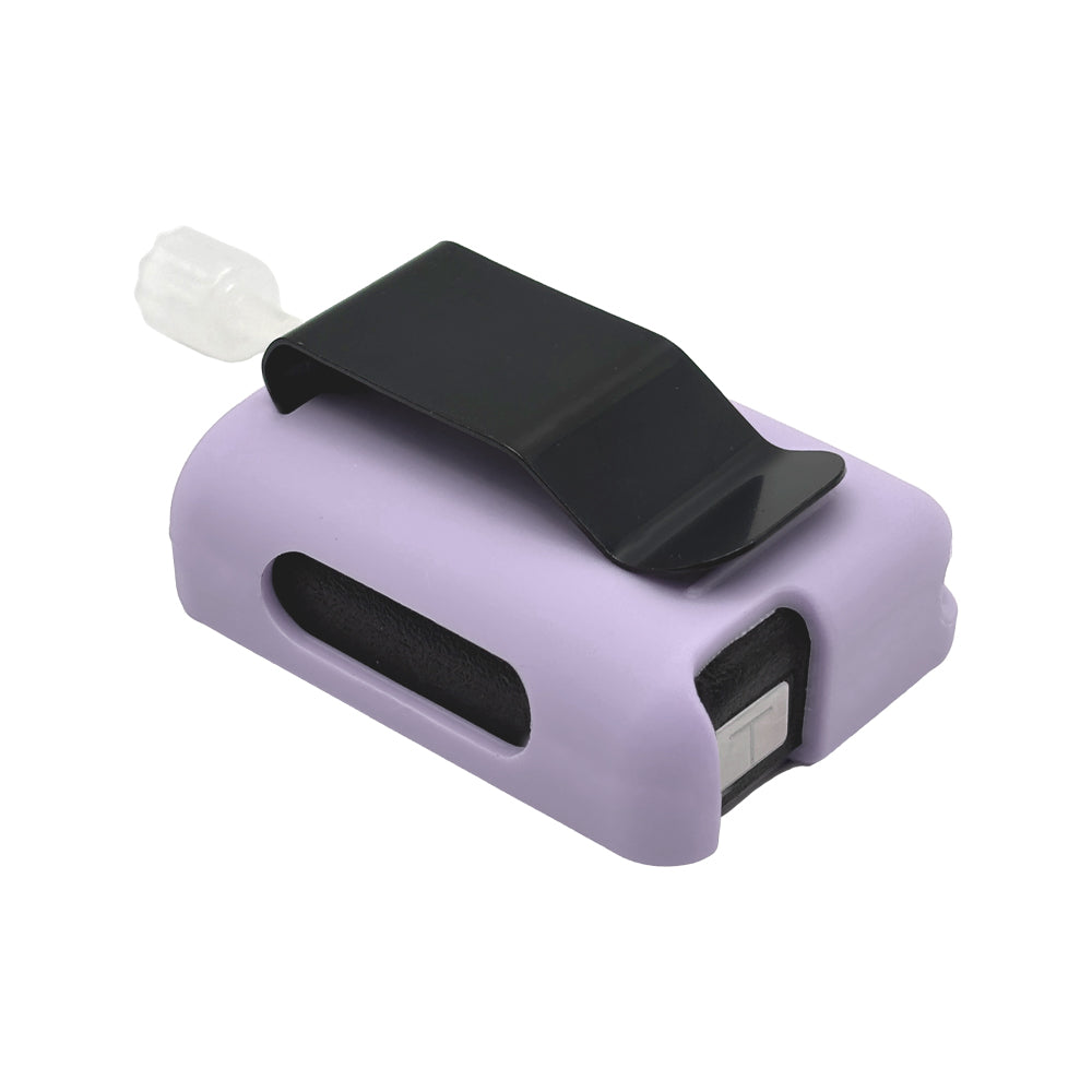 Lavender Tandem Mobi EZ-To-Charge Clip with Mobi insulin pump inside the case, laying flat on a surface.